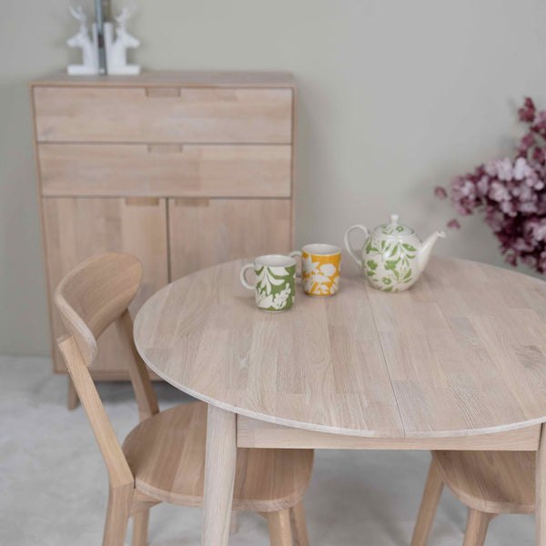 Round extendable dining table in solid oak Escandi 3, 100-130 x 100 x 75 cm | NordicStory