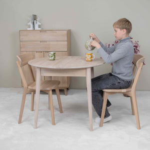 Round extendable dining table in solid oak Escandi 3, 100-130 x 100 x 75 cm | NordicStory