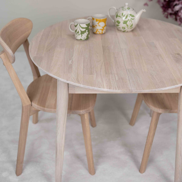 Round extendable dining table in solid oak Escandi 3, 100-130 x 100 x 75 cm | NordicStory