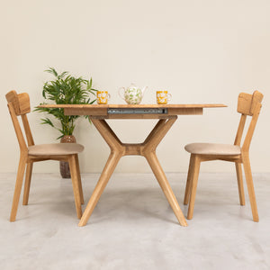 Round extendable dining table in solid oak Carmen | NordicStory