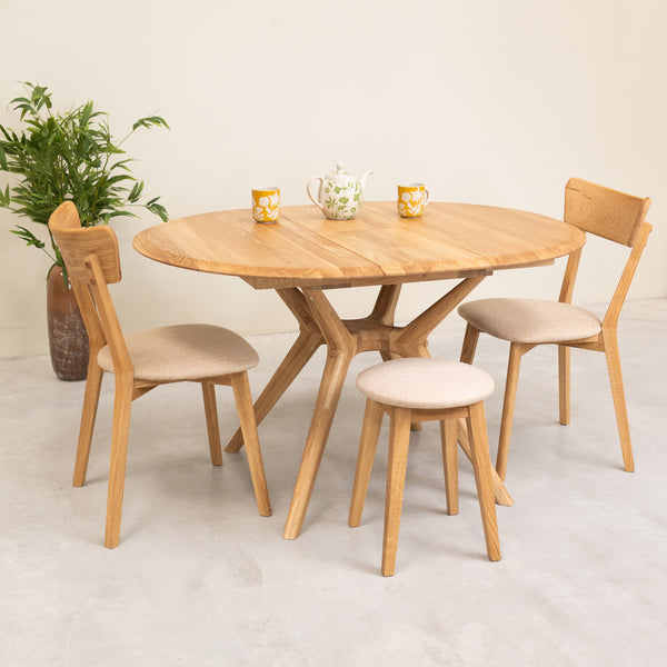 Round extendable dining table in solid oak Carmen | NordicStory