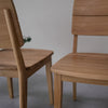 NordicStory Pack of solid oak dining chairs from the Mauritz collection Nordic furniture with a modern oak design.