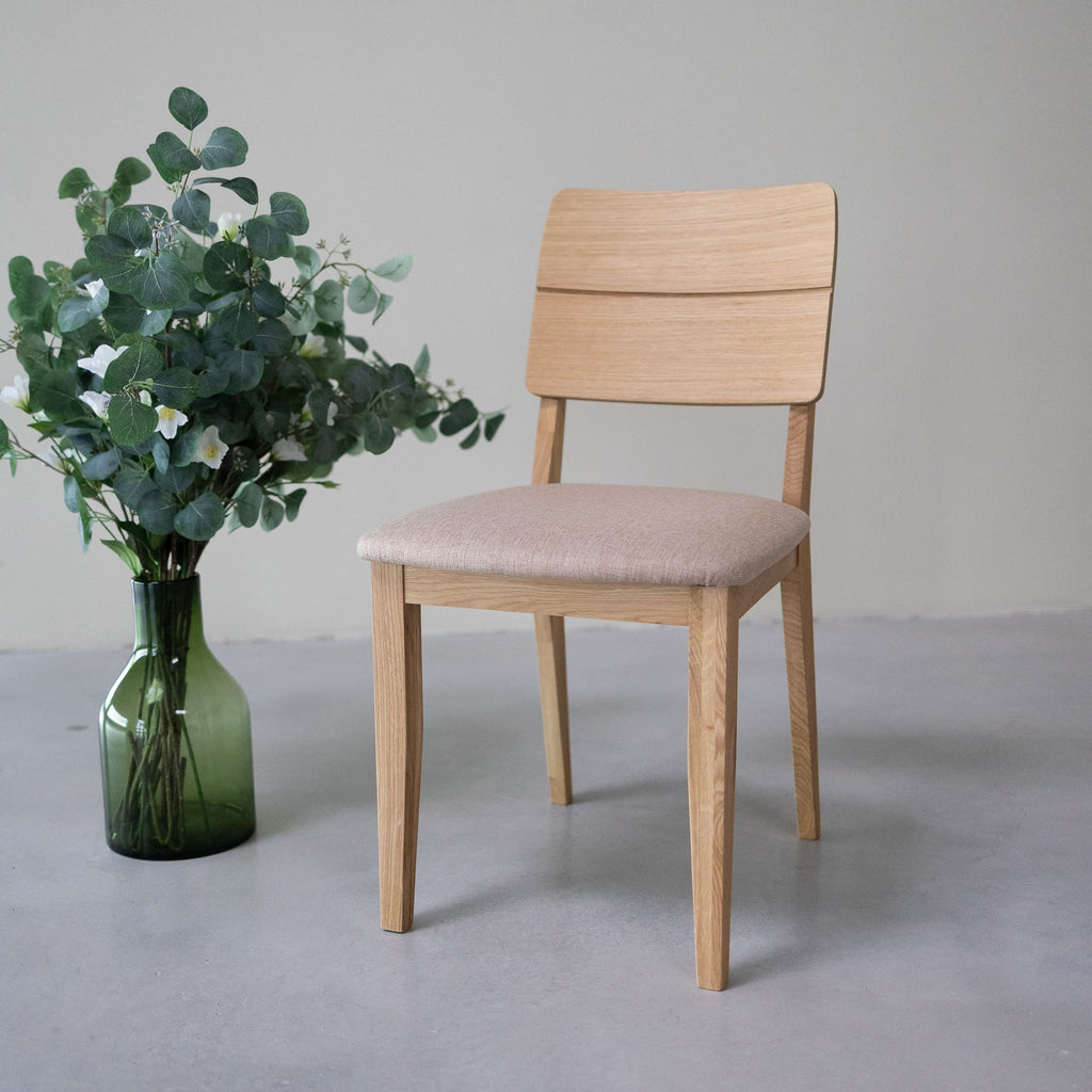 NordicStory Pack of upholstered solid oak dining chairs from the Mauritz collection Furniture in Nordic beige color with a modern design Oak.