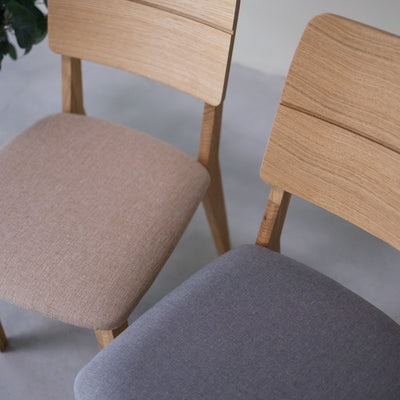 NordicStory Pack of upholstered solid oak dining chairs from the Mauritz collection Furniture in Nordic beige color with a modern design Oak.