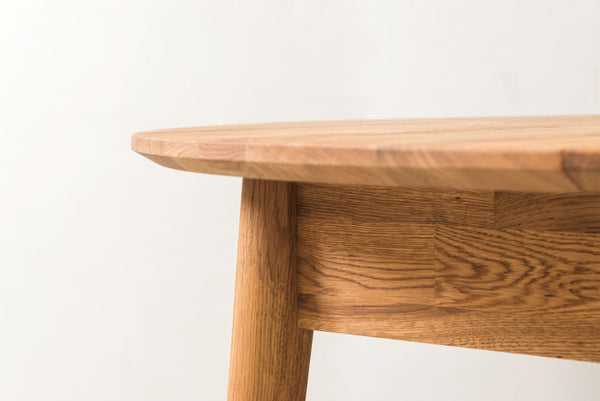 NordicStory Round extendable solid oak dining table with round top