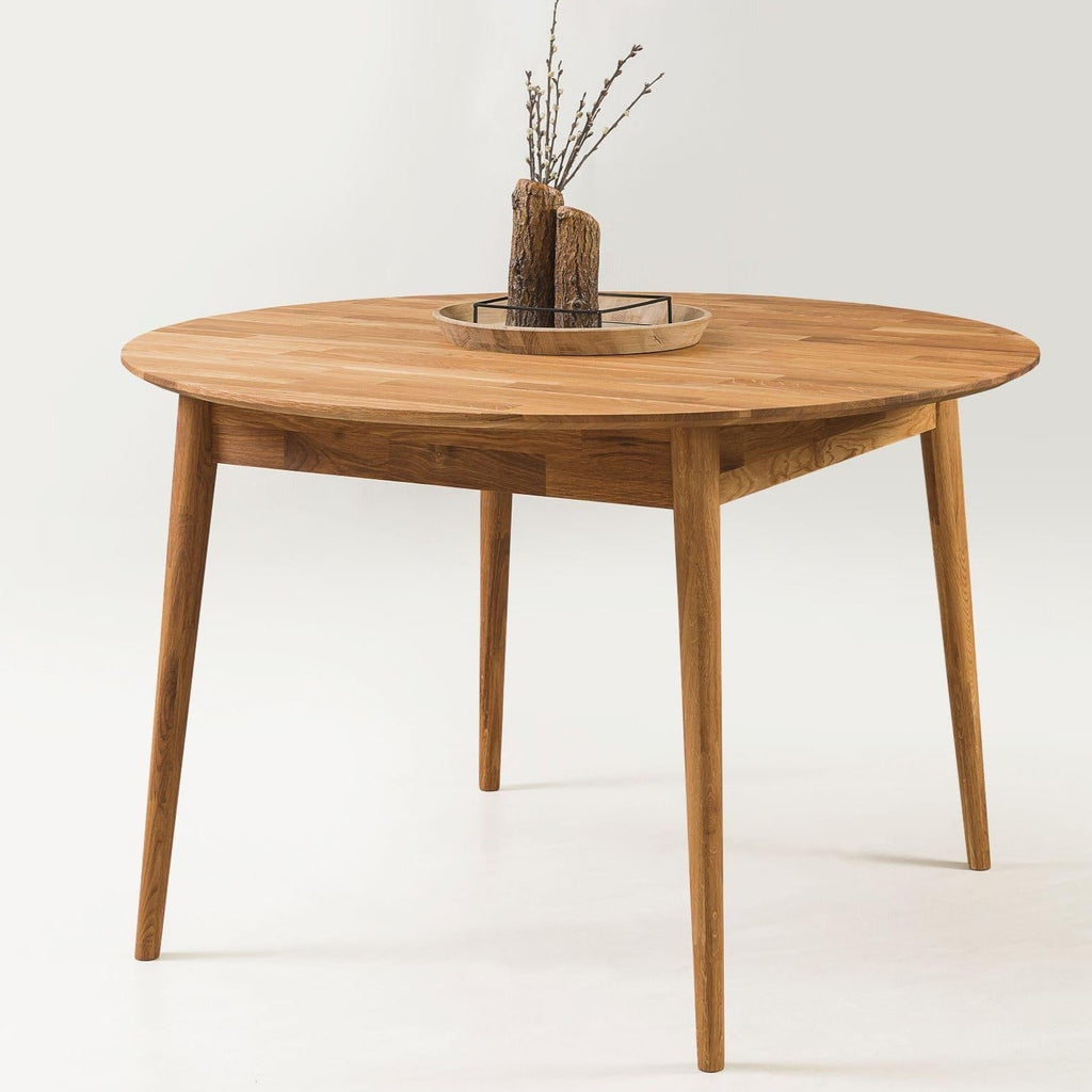 NordicStory Round extendable solid oak dining table with round top