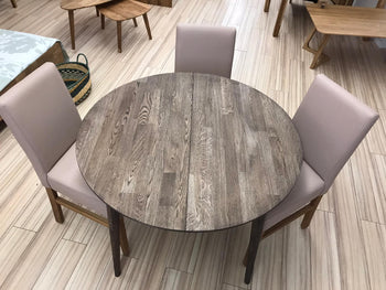 NordicStory Round extendable solid oak dining table with round top 