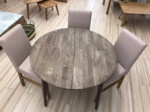 NordicStory Round extendable solid oak dining table with round top 